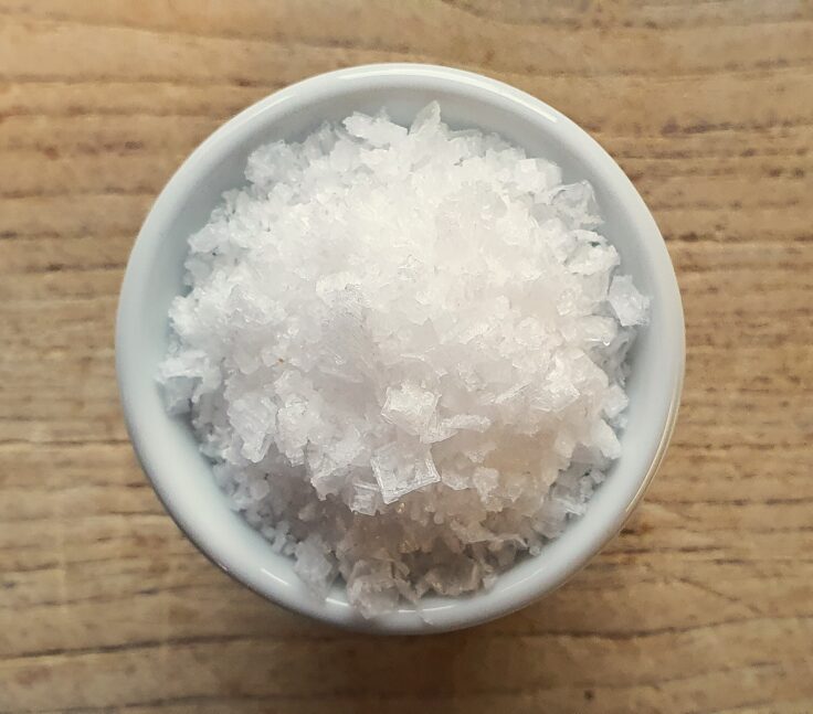 Sea salt flakes in bowl